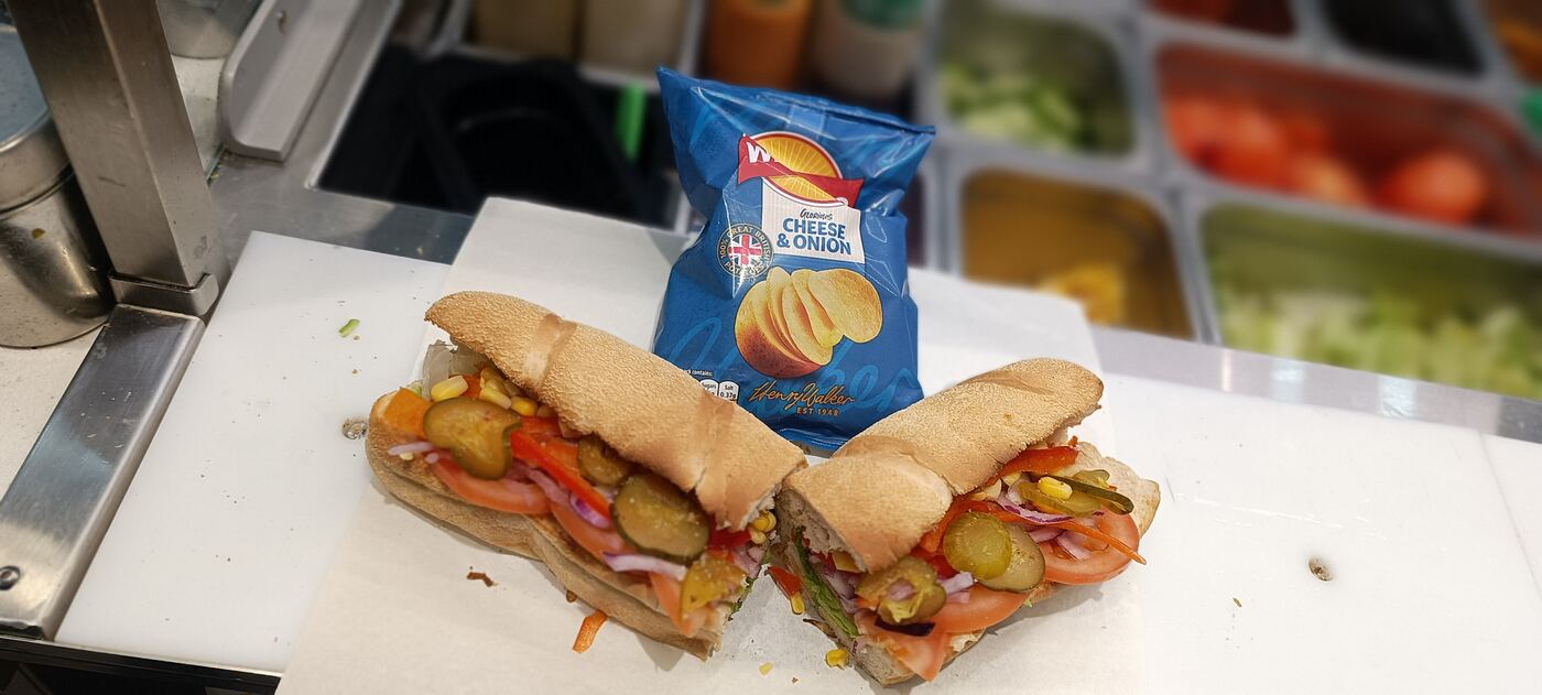 Sub with salad and crisps